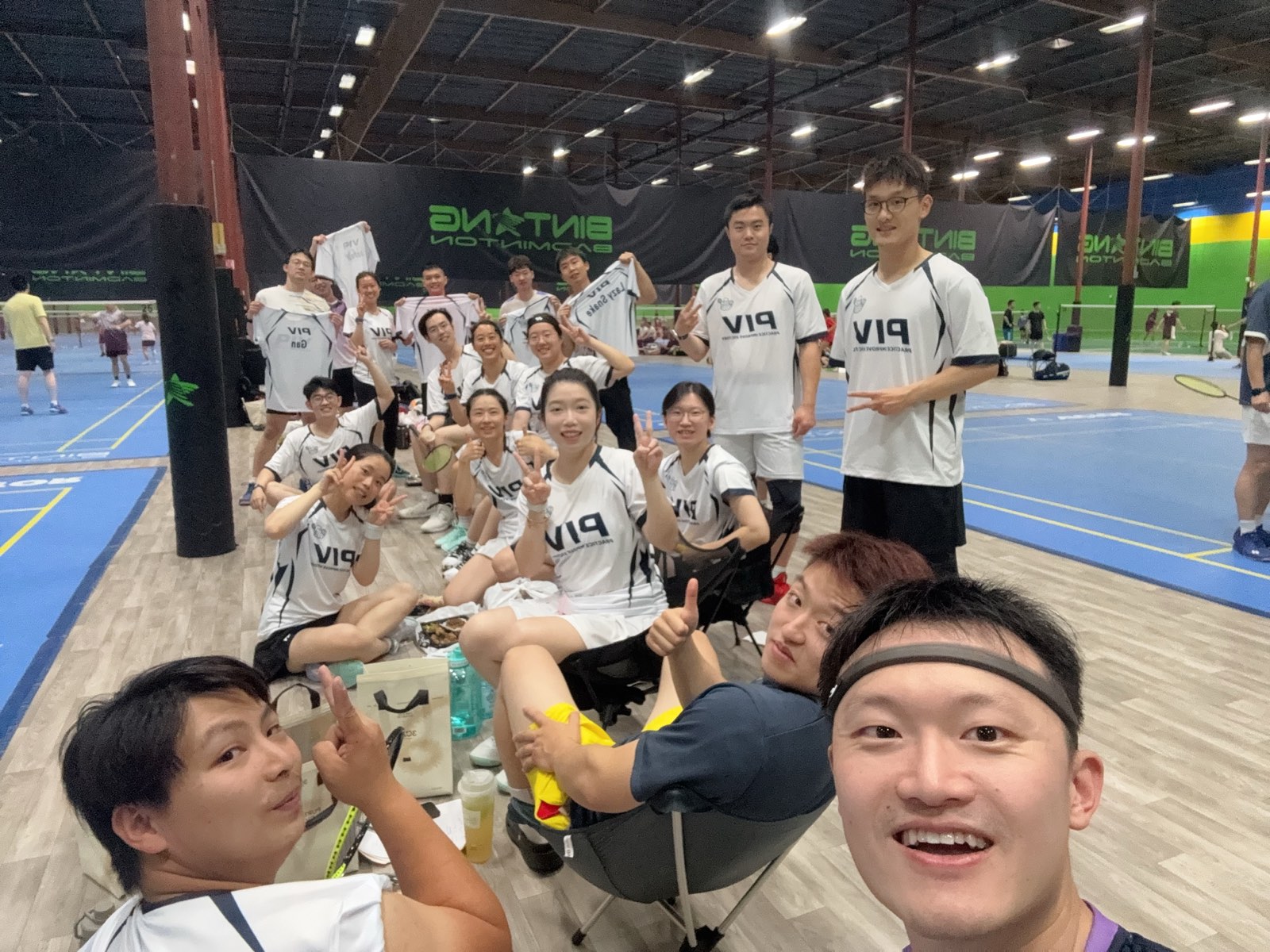 PIV teammates gathered courtside between matches, waving jerseys and giving peace signs at the camera